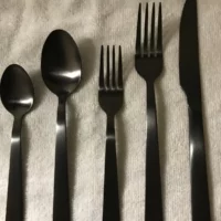 Dark gray satin finish place settings