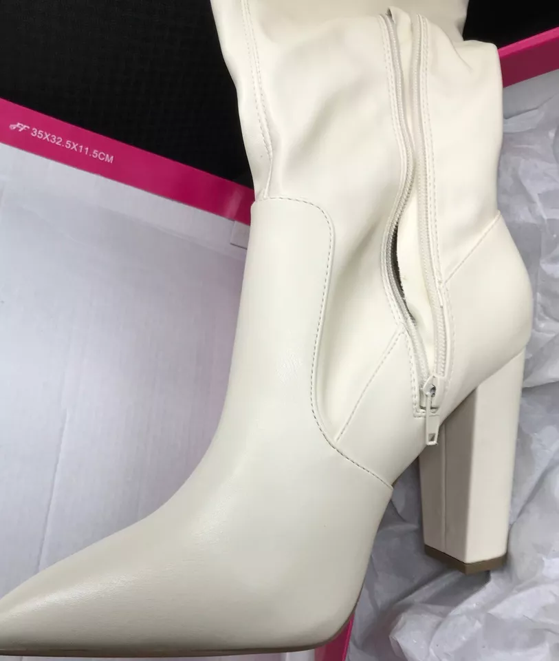 Thigh high high heeled high